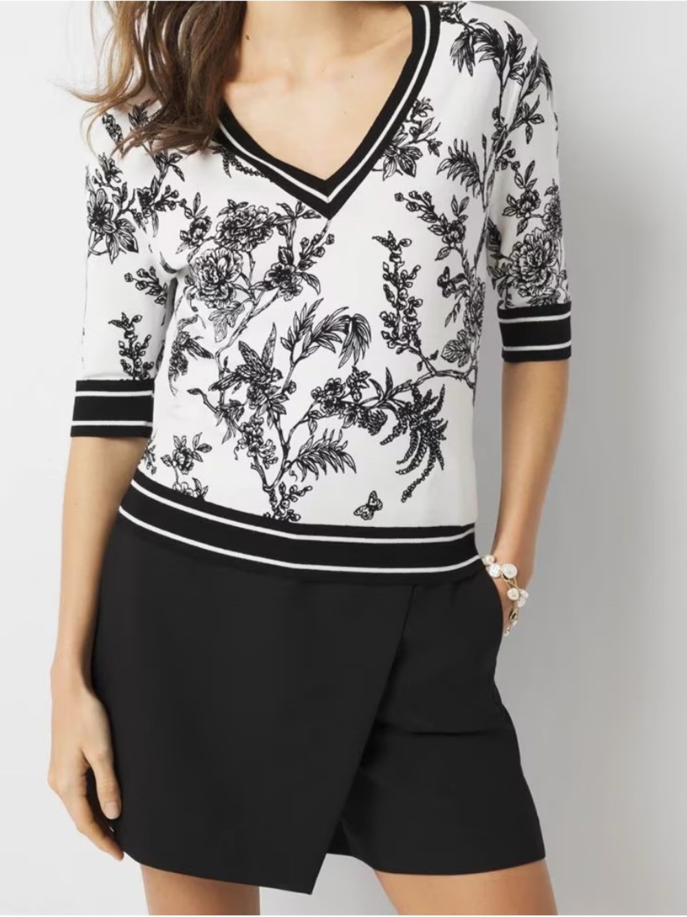 White House Black Market | White Top with Black Trim and Subtle Floral Print